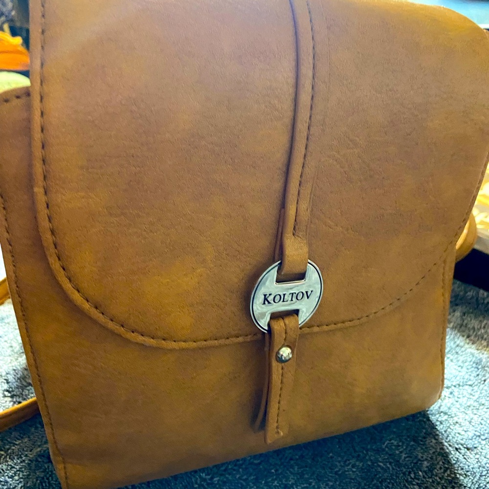 Koltov camel tan backpack with silver accent and adjustable straps md Sz